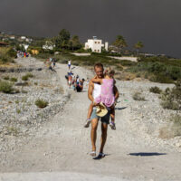 Wildfires in Greece engulf island of Rhodes as tourists seek safety