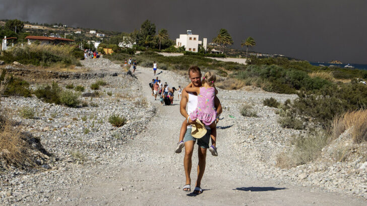 Wildfires in Greece engulf island of Rhodes as tourists seek safety