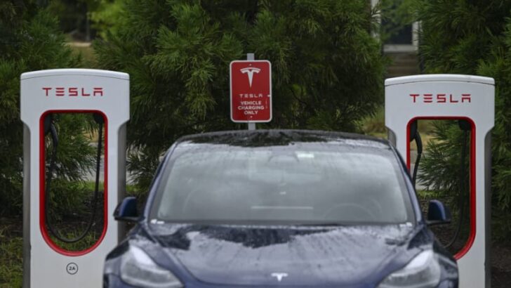 Tesla reports record quarter for sales