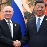 Vladimir Putin ‘sent body double to China’ to meet Xi as he has ‘days to live’